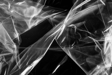 Kapalı plastik plastik yırtık ambalaj dokusu. Vektör illüstrasyonunda çeşitli buruşuk, buruşuk ve farklı gözyaşı desenli şeffaf plastik ambalajlar görülüyor. Siyah gri dizaynlar ve gölge etkisi.