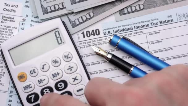 Individual Income Tax Return Forms Paper Tax Day April Concept — Stock Video