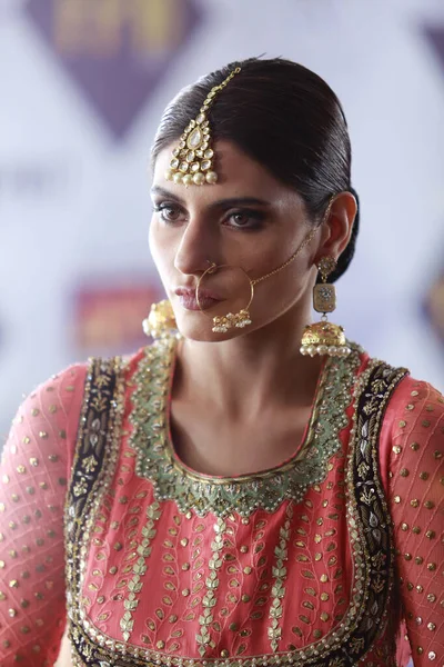 stock image Model backstage posing in Traditional Indian Pakistani Bridal dress at Fashion Pakistan Week Winter Festive 21-22 Day 2. Fashion week in Karachi 15th October 2021