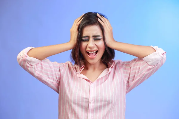 Anxiety, bipolar woman crying, frustrated or crazy on a dark studio for psychology and mental health mock up. Trauma, schizophrenia or depressed girl shout with depression, fear and mental illness