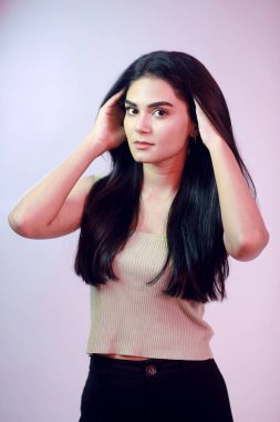 Beautiful model girl with straight long hair. Keratin straightening . Treatment, care and spa procedures. Smooth hairstyle.