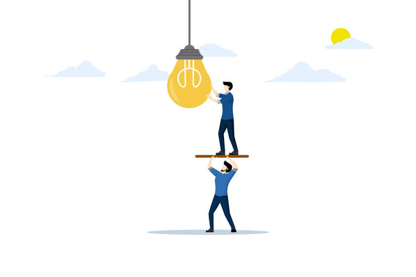 Concept of collaboration and cooperation, partnership for mutual success, teamwork helps get solutions, support for togetherness, businessman helps support colleagues to turn on the light bulb.
