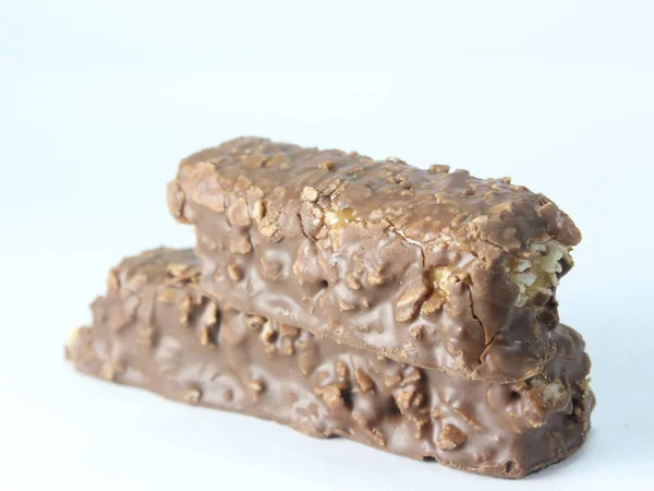close up of homemade chocolate bar isolated on white background