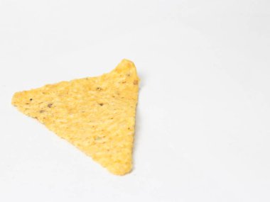 single tortilla chip on white background, tasty and delicious chips