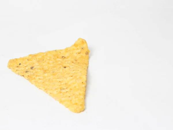 single tortilla chip on white background, tasty and delicious chips