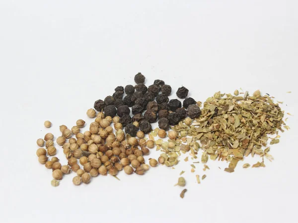 Seasoning with black pepper, dried basil and coriander is ready to use