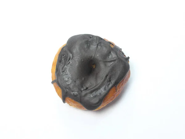 donut with chocolate cream on white background, flat lay view