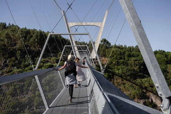 stock image 2 July 2023, Walking trough the 516 Suspension Bridge in AroucaGeoPark, Arouca, Portugal.