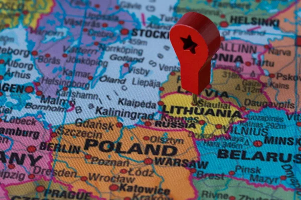 Red pin, point on the map of Lithuania. Concept travel background