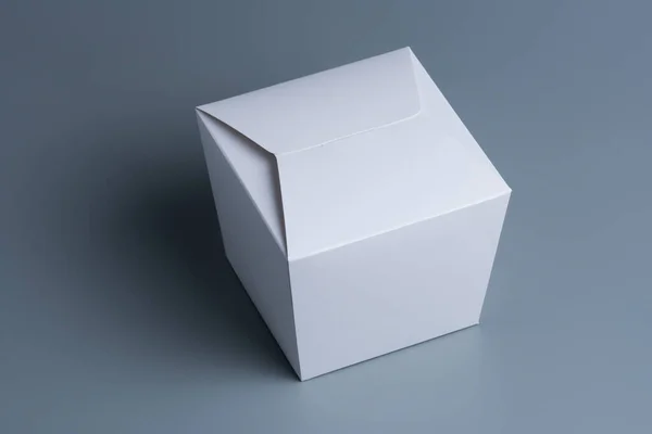 Caja Blanca Aislada Sobre Fondo Gris — Foto de Stock