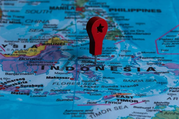 Red pin, point on the map of Indonesia. Concept travel background