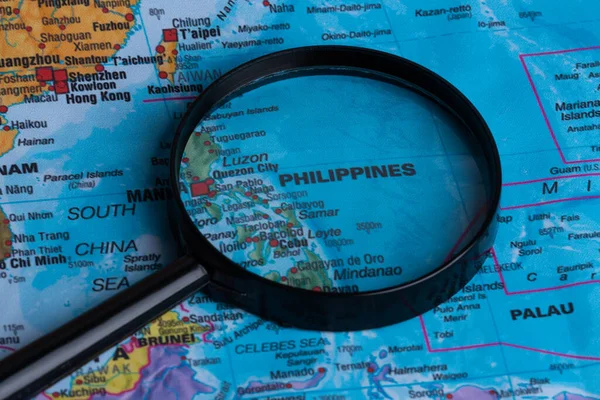 Map of Philippines through magnifying glass.Close-up