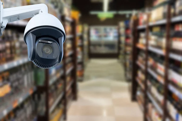 ショッピングモールにおけるCctvカメラシステムのセキュリティの背景をぼかす ぼやけた人々とショッピングセンターと抽象的な背景 — ストック写真