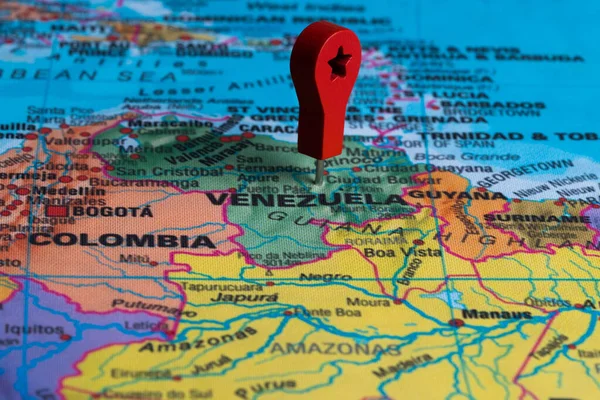Red pin, point on the map of Venezuela. Concept travel background