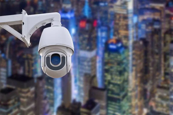 CCTV monitoring, security cameras. Backdrop with views of the city during twilight