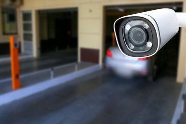 cctv camera installed on the parking lot to protection security. Copy space