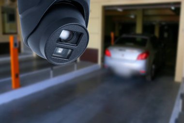 cctv camera installed on the parking lot to protection security. Copy space