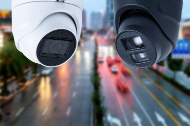 Closeup of traffic security camera surveillance CCTV on the road in the big city