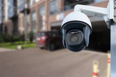 Closeup CCTV camera monitoring in the cars park. An automated car parking system