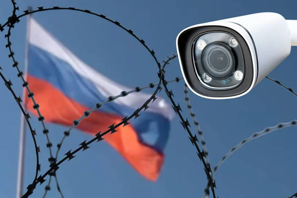 Stock image Barbed wire on background of flag of Russia. Sanctions against Russia