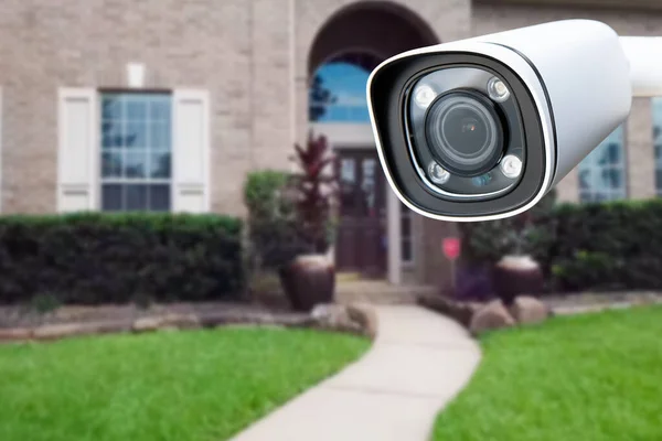 Security camera and private house on the background