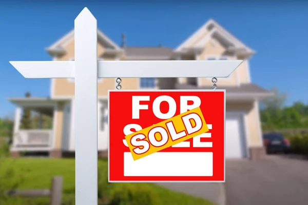 Sold Home For Sale Sign in Front of New House