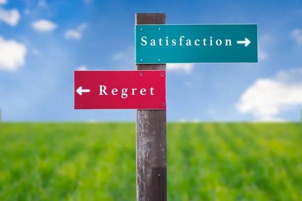 stock image Street Sign the Direction Way to Satisfaction versus Regret