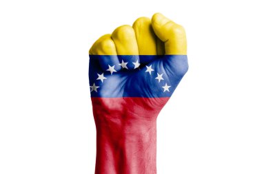 VENEZUELA bayrağının insan eli yumruğu. Yakın plan.
