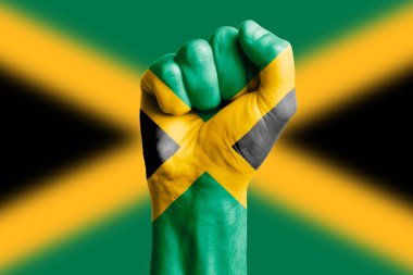 JAMAICA bayrağının insan eli yumruğu. Yakın plan.
