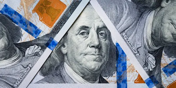 Dolar ABD kapatın. Benjamin Franklin'in gözlerinden 100 dolar. Dolarlık banknot parçası doku. 100 Amerikan Doları