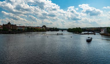 Prague city scenery with Vltava river from Charles bridge during beautiful springtime day
