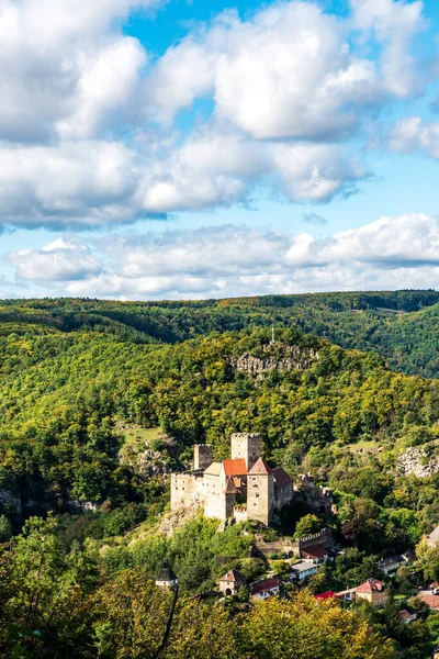 stock image Hardegg castle ruins with hills covered by forest with few rocks - beautiful scenery in Thaytal National park in Austria ner borders with Czech republic