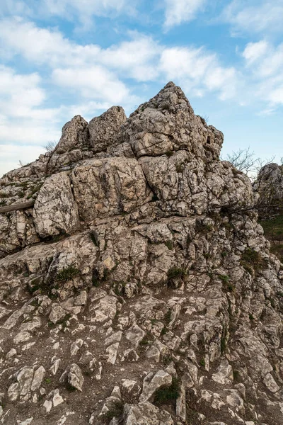stock image Limestone roc below Devin hill summitk with blue sky above in Palava mountains in Czech republi