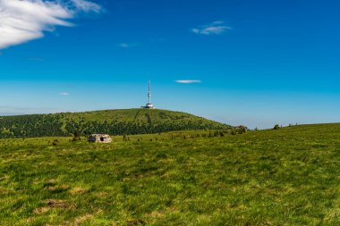 Praded hill from Vysoka hole hill in Jeseniky mountains in Czech republic during beautiful summer day clipart