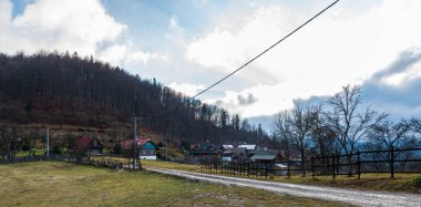 Kycera settlement near Cadca city in Javorniky mountains in Slovakia during late autumn day clipart