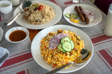 Popüler Pakistan yemekleri Mutton Biryani - Babür İmparatorluğu kökenli geleneksel bir karışık pirinç yemeği