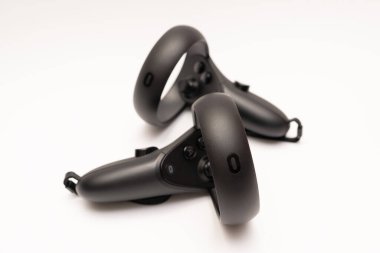 oculus rift touch controller isolated on white background. virtual reality wireless system created by Oculus VR, division of Facebook.