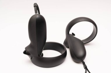 oculus rift touch controller isolated on white background. virtual reality wireless system created by Oculus VR, division of Facebook.