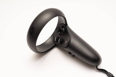 oculus rift touch controller isolated on white background. virtual reality wireless system created by Oculus VR, division of Facebook.