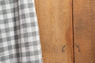 Gri ve beyaz tekstili ahşap masa arkaplanı. Metin için alanı kopyala.