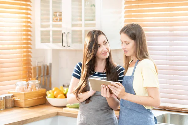 Beautiful Lesbian Couple Cooking Healthy Food Looking Digital Tablet Modern — Stock Photo, Image