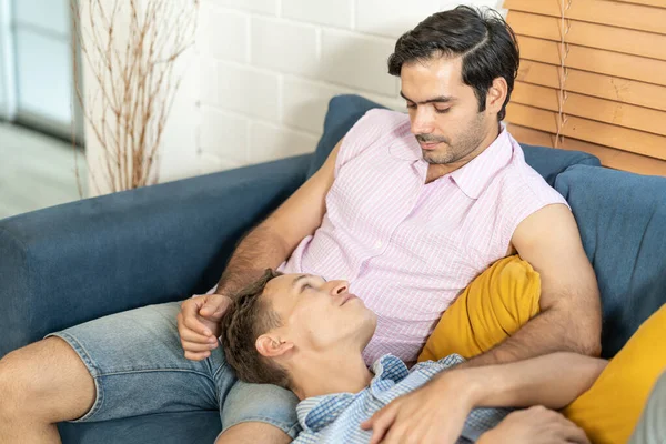 Loving Same Sex Male Couple Lying Sofa Home Watching Relaxing — Stock Photo, Image