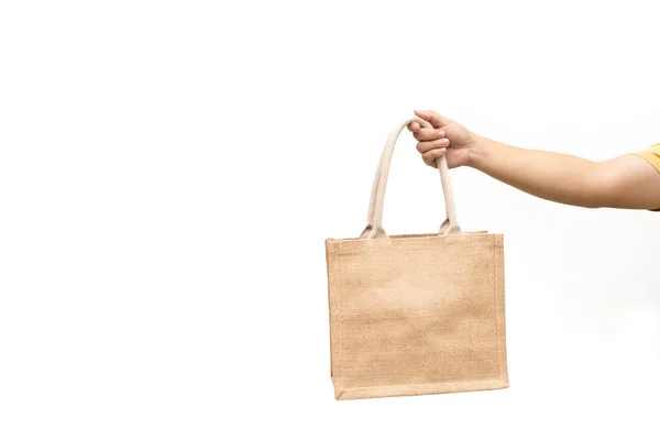 男は白い背景にジュートバッグや袋を保持 再利用可能なショッピングバッグ プラスチックフリー 環境に優しいコンセプト 再利用可能なショッピングライフスタイル 生態ビジネスコンセプトのための袋を袋 — ストック写真