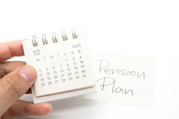Desk calendar and Pension Plan Note Paper isolated on white background. For retirement, Pension Plan concept. Last date of work.
