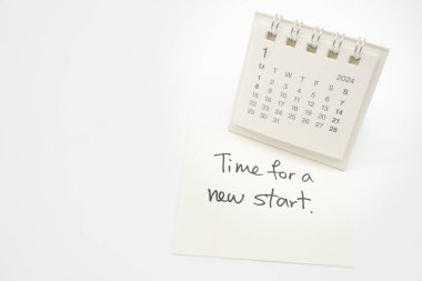 Kağıt üzerinde 2024 Jan takvimi, İş Konsepti ile Yeni Başlangıç Metni Zamanı. Yeni Yıl Yeni Başlangıç.