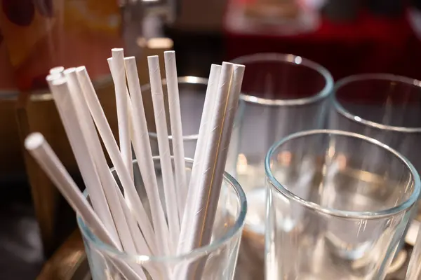 Paper straws made of eco friendly paper. Close up on white paper straws facing upwards. ecologically friendly yet durable paper drinking straws.