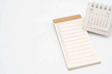 Boş Kontrol Listesi ya da boş küçük not defteri işaretli metin ve Aralık 2024 için basit masa takvimi. DEC 'deki metin için yapılacaklar listesi boş. Boşluğu Kopyala.