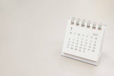 Ocak 2025 arkaplanı için basit masa takvimi. Takvim konsepti kopyalama alanı. 2025 Jan takvimi.