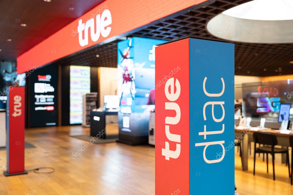 True Logo at True shop service to customers. True and dtac combine Being a service business entrepreneur Mobile networks.