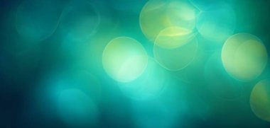 Soyut Bokeh ışıkları rüya gibi bir atmosfer yaratıyor. Afişler, posterler ve web amaçları için en iyi bokeh arkaplan fotoğrafları.